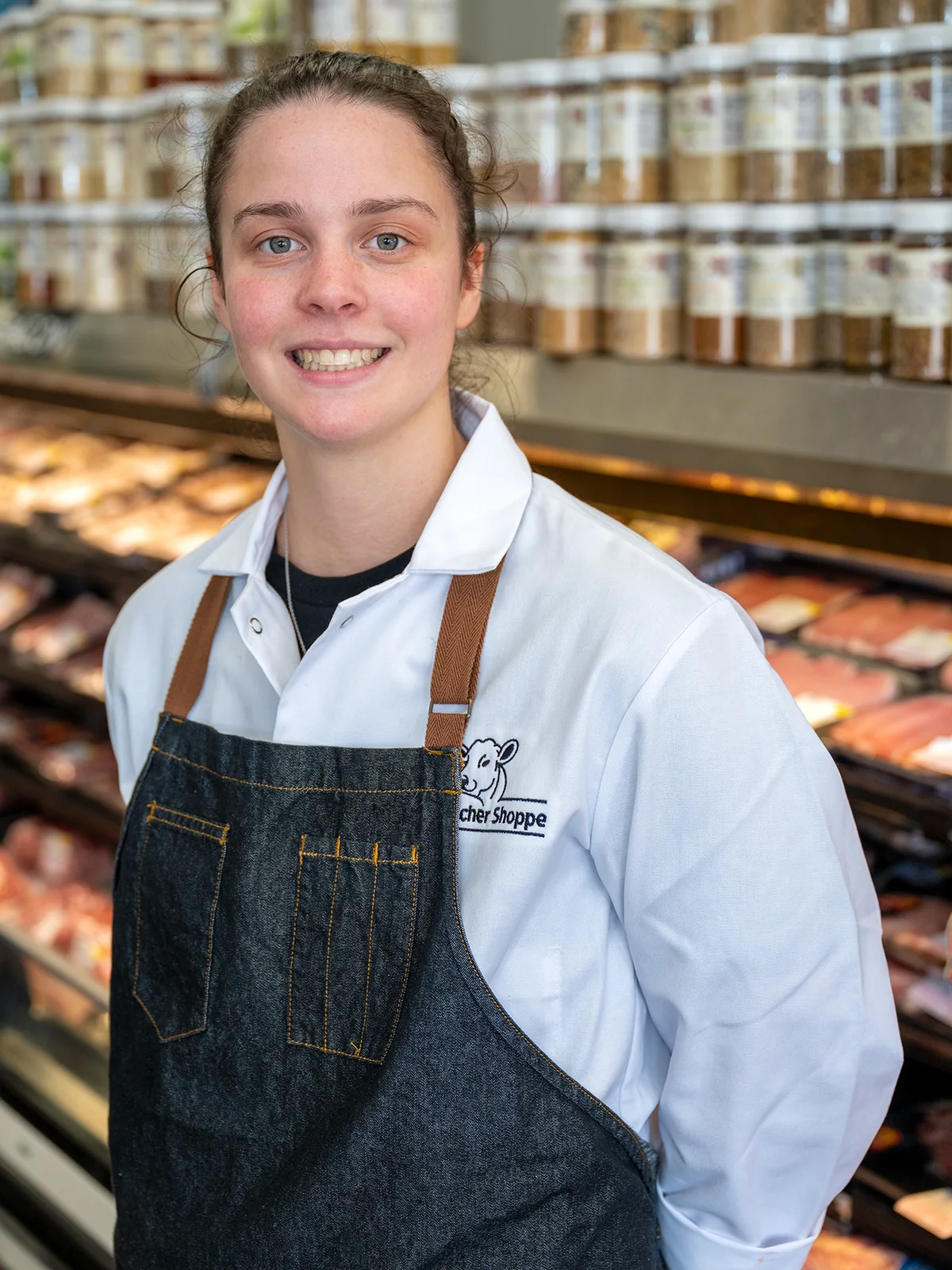 A butcher at The Butcher Shoppe ready to help at the counter