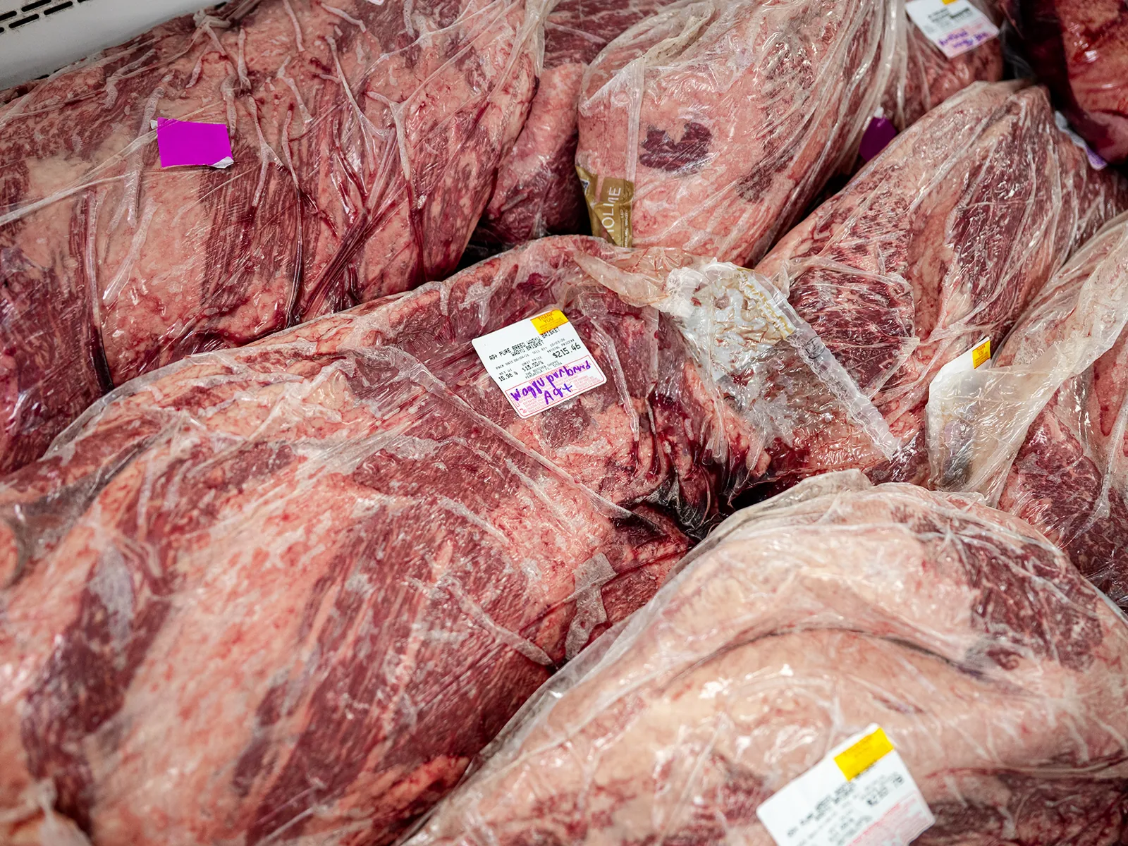 Competition briskets packed in the meat case