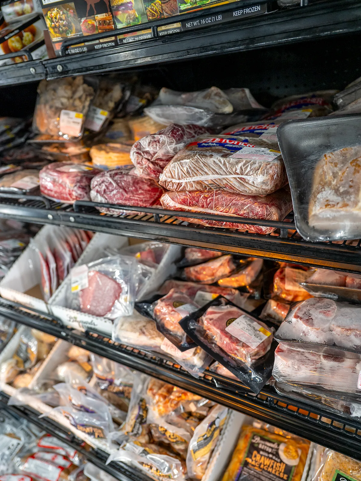 Freezer section with spices and specialty frozen items