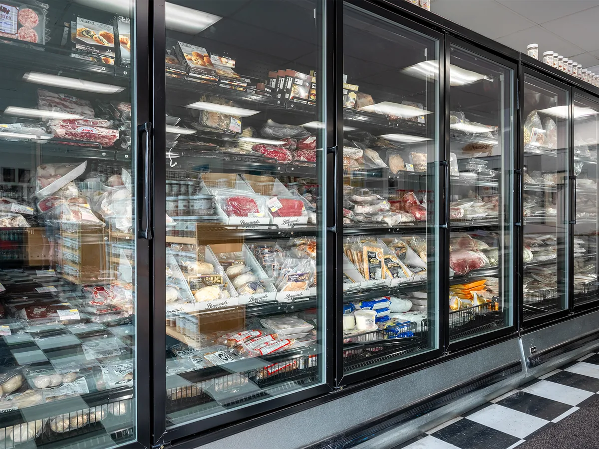 Freezer cases of frozen and ready-to-cook items