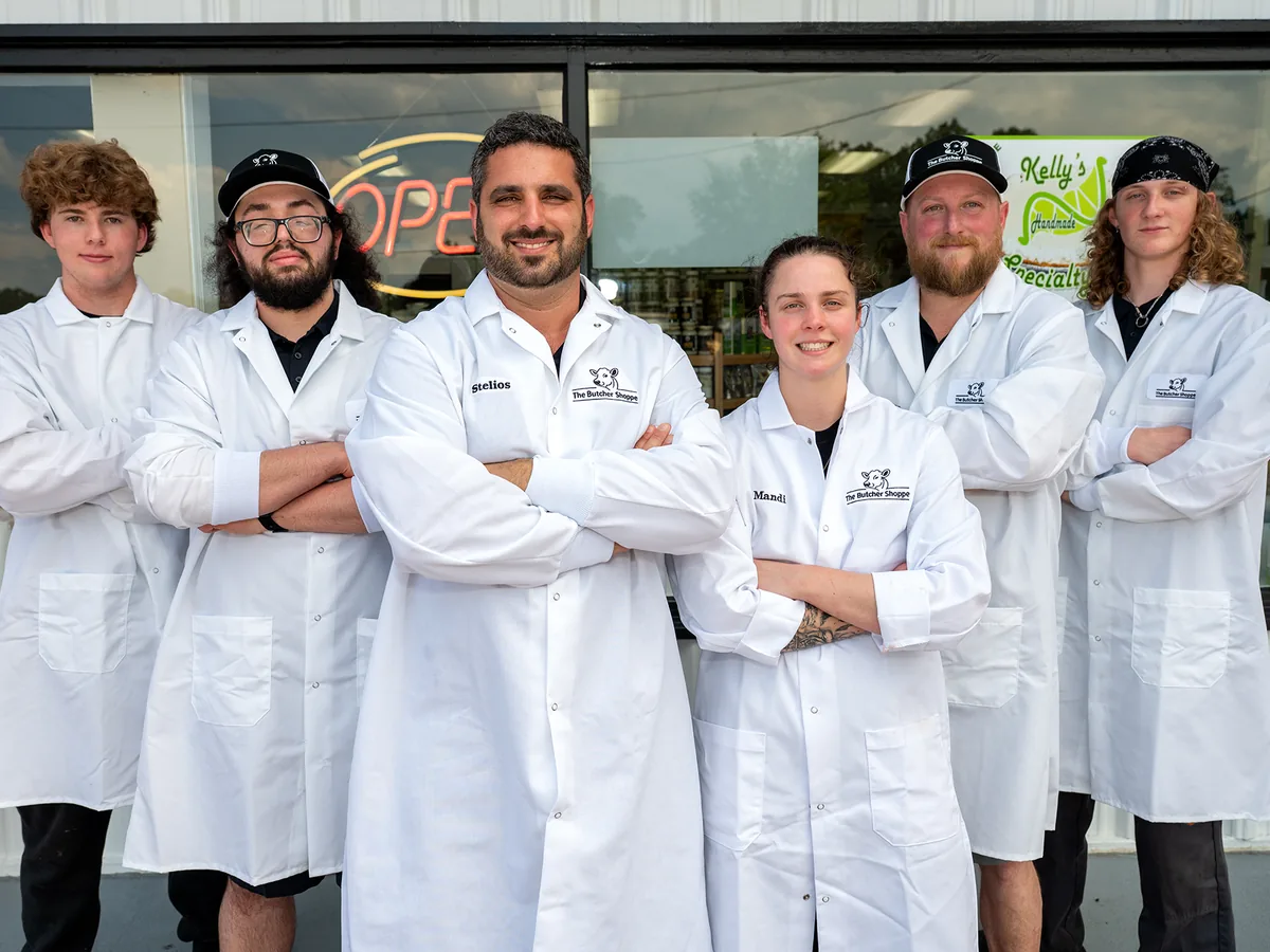 The butcher crew in white coats