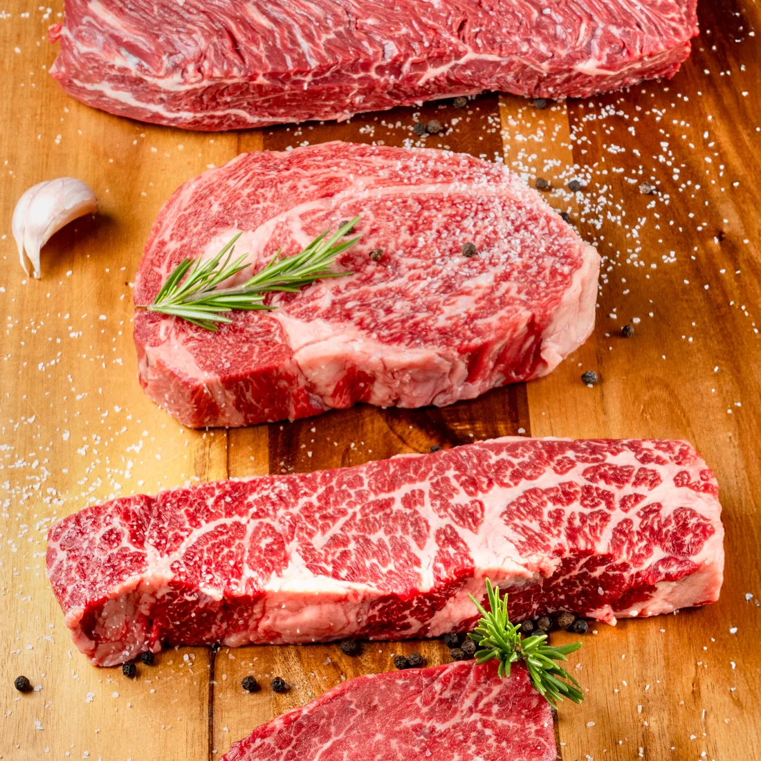 Assortment of raw meats in a butcher bundle