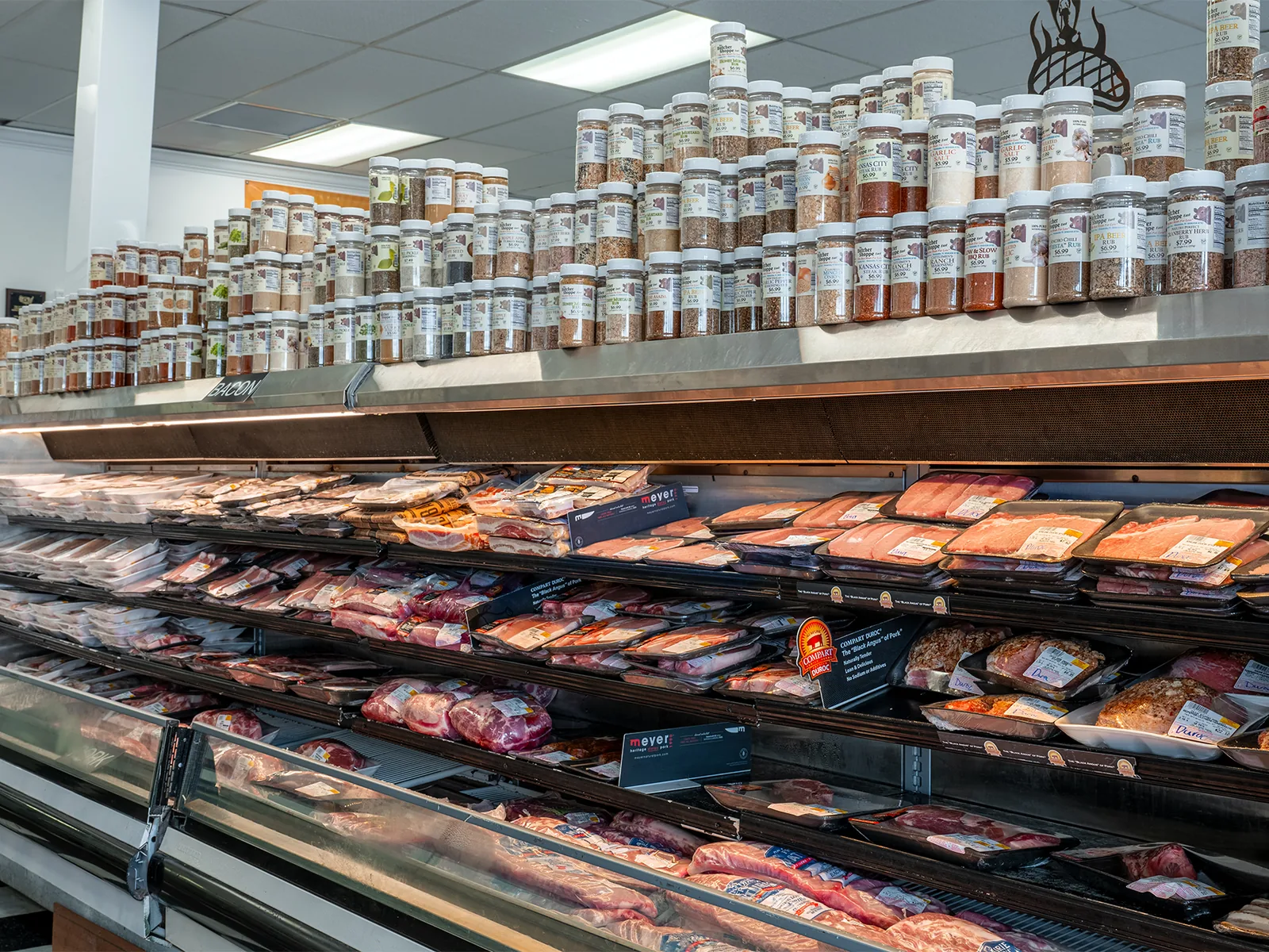 The butcher counter with specialty cuts and service area